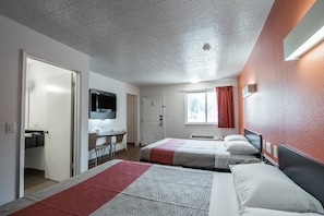 Wifi gratis, ropa de cama y despertador