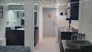North King Bed, Kitchen Partial View (No Pets Allowed) | Private kitchenette | Fridge, microwave, cookware/dishes/utensils
