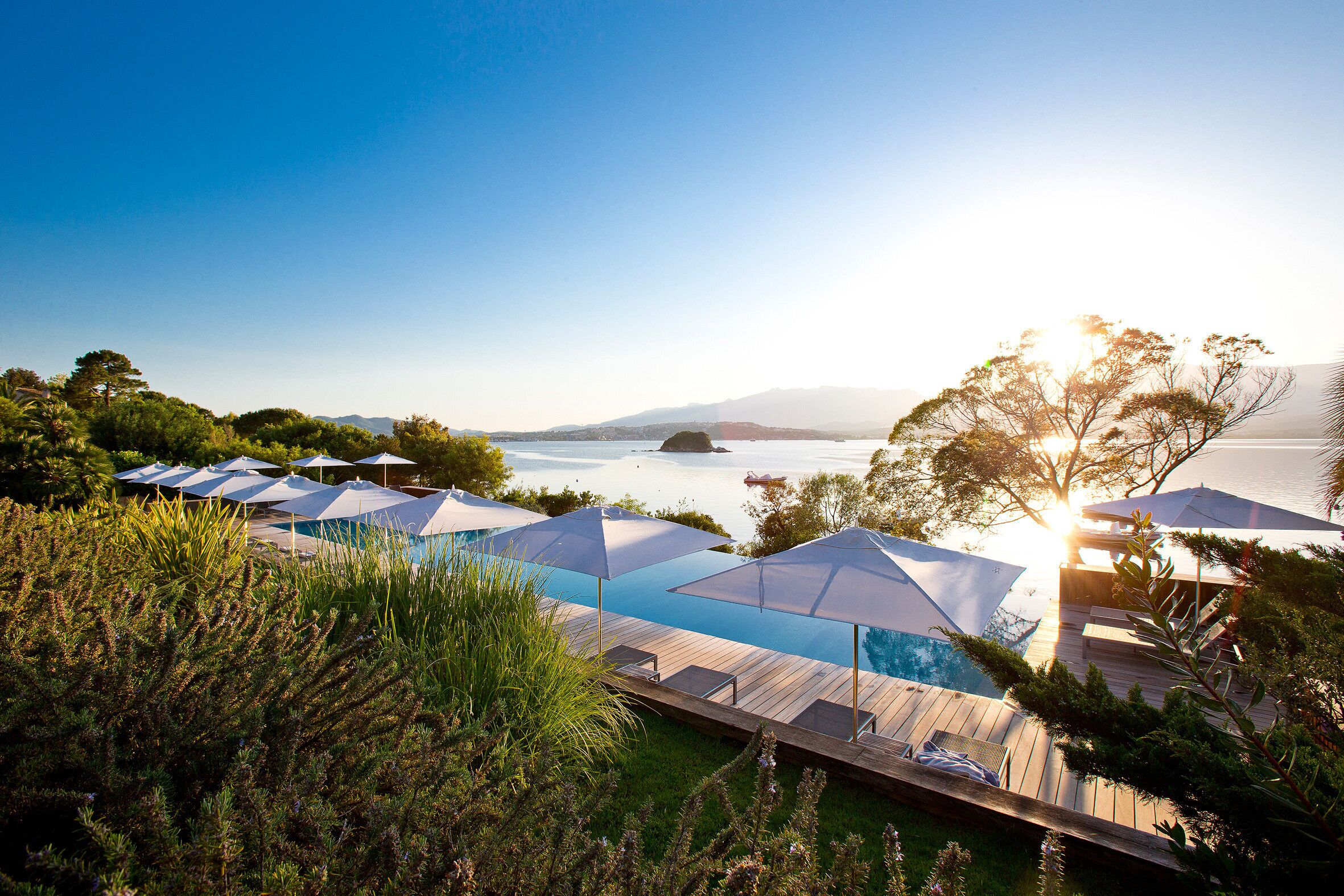 Outdoor pool, pool umbrellas, sun loungers