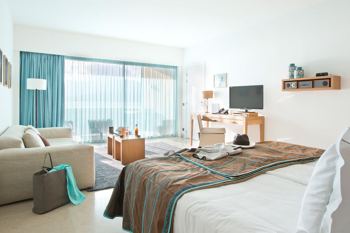 Ropa de cama de alta calidad y minibar