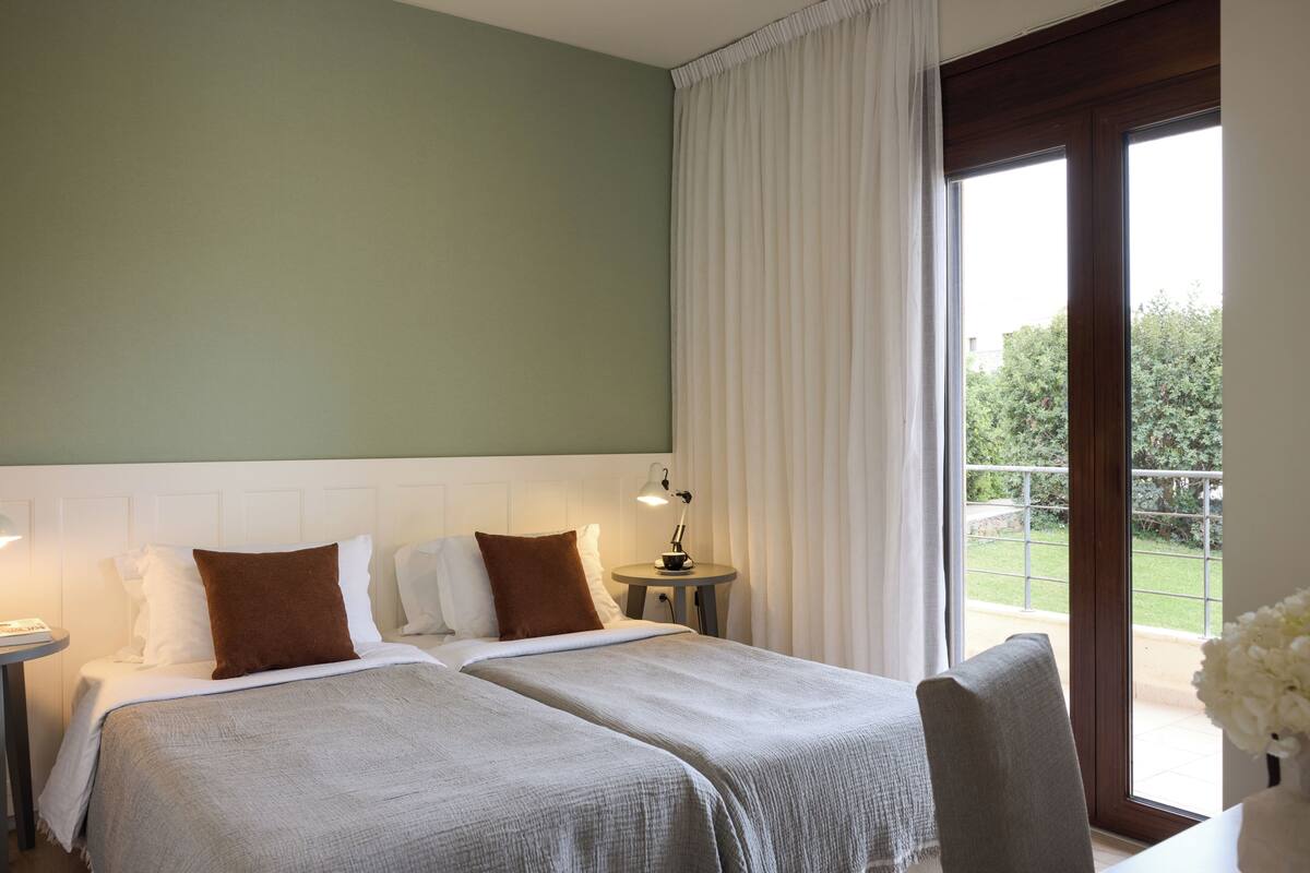 Elounda Seafront Villa | Premium bedding, down comforters, minibar, in-room safe