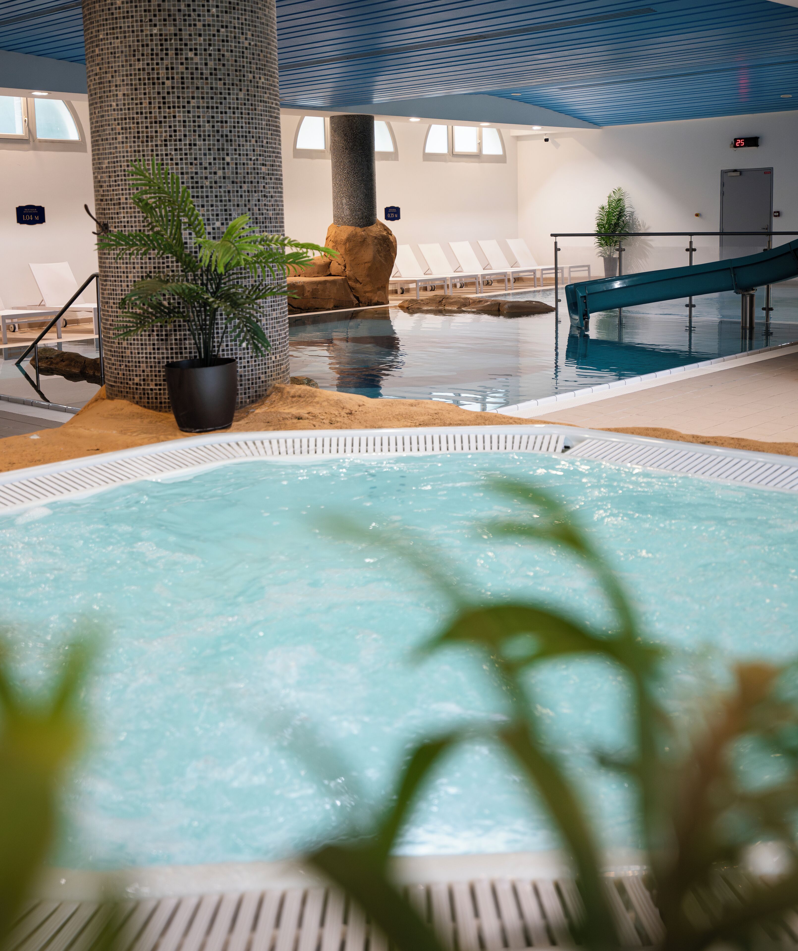 indoor pool, seasonal outdoor pool, pool umbrellas, pool loungers