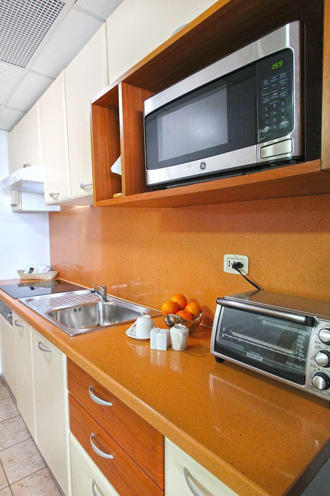 studio, 1 bedroom, balcony, ocean view | private kitchen | full-sized fridge, microwave, oven, stovetop