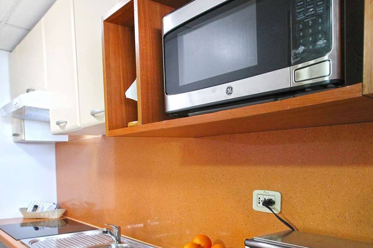 studio, 1 bedroom, balcony, ocean view | private kitchen | full-sized fridge, microwave, oven, stovetop