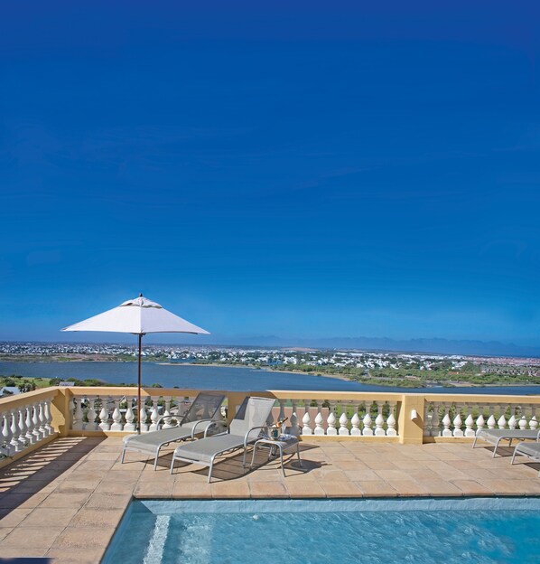 Outdoor pool, pool umbrellas, pool loungers