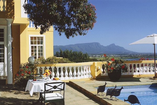 Outdoor pool, pool umbrellas, sun loungers