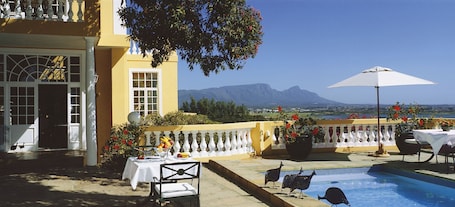 Outdoor pool, pool umbrellas, pool loungers