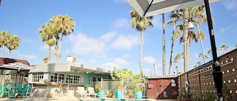 Seasonal outdoor pool, a heated pool, sun loungers