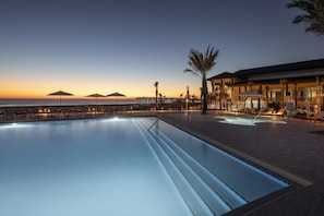 Outdoor pool, open 9:00 AM to 7:00 PM, sun loungers