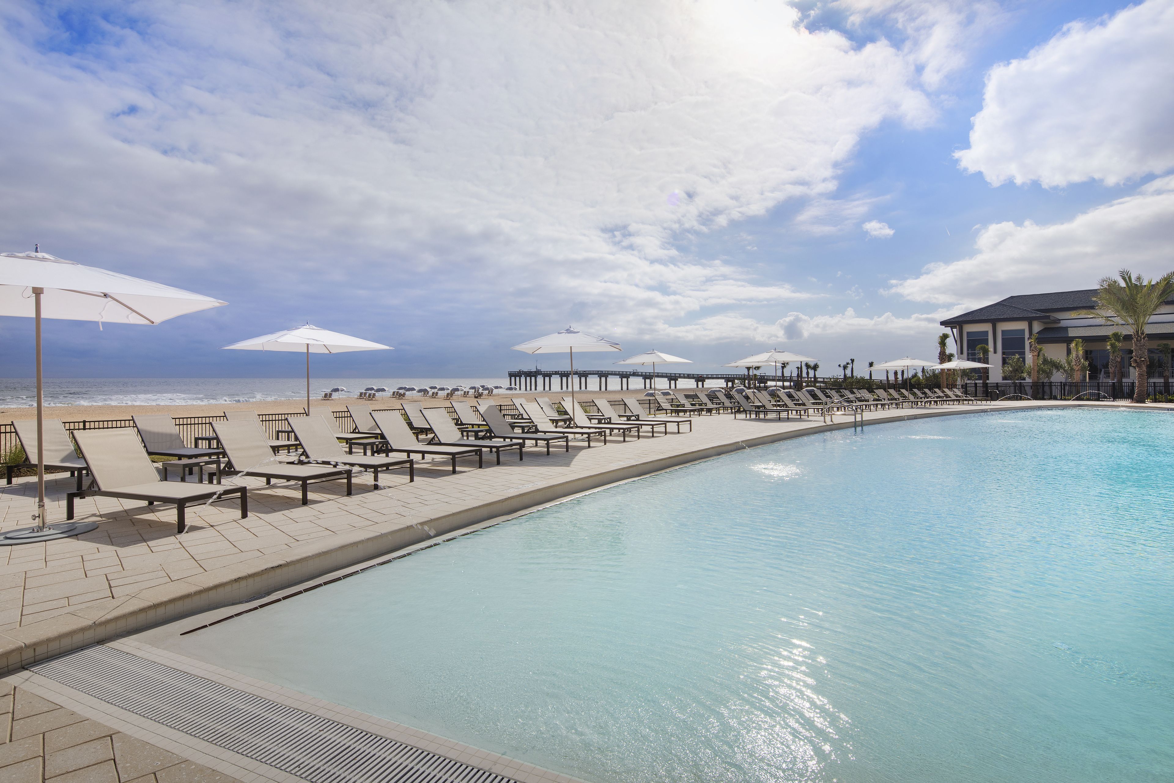 outdoor pool, open 9:00 am to 7:00 pm, pool loungers