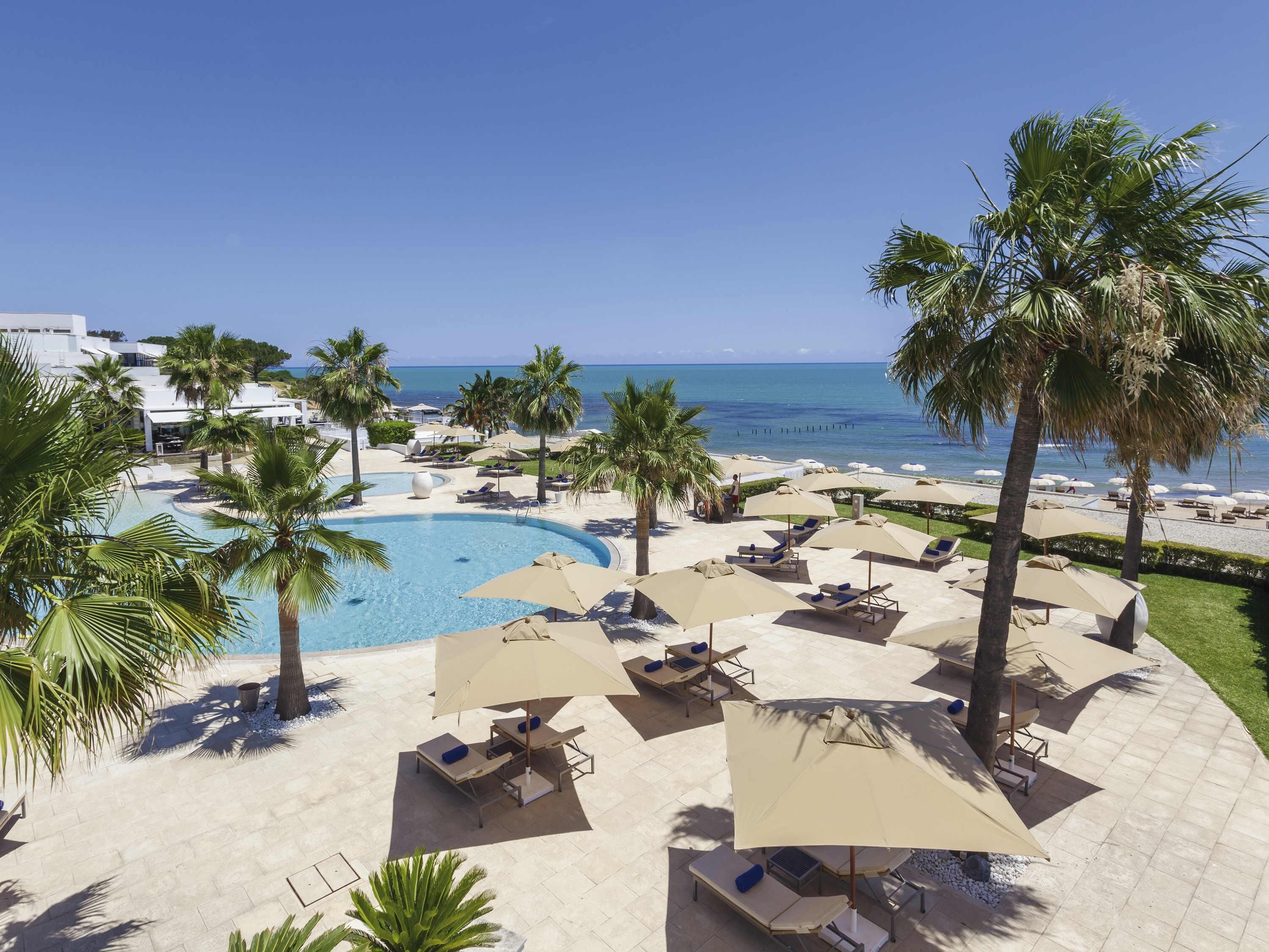 Indoor pool, 2 outdoor pools, free pool cabanas, pool umbrellas