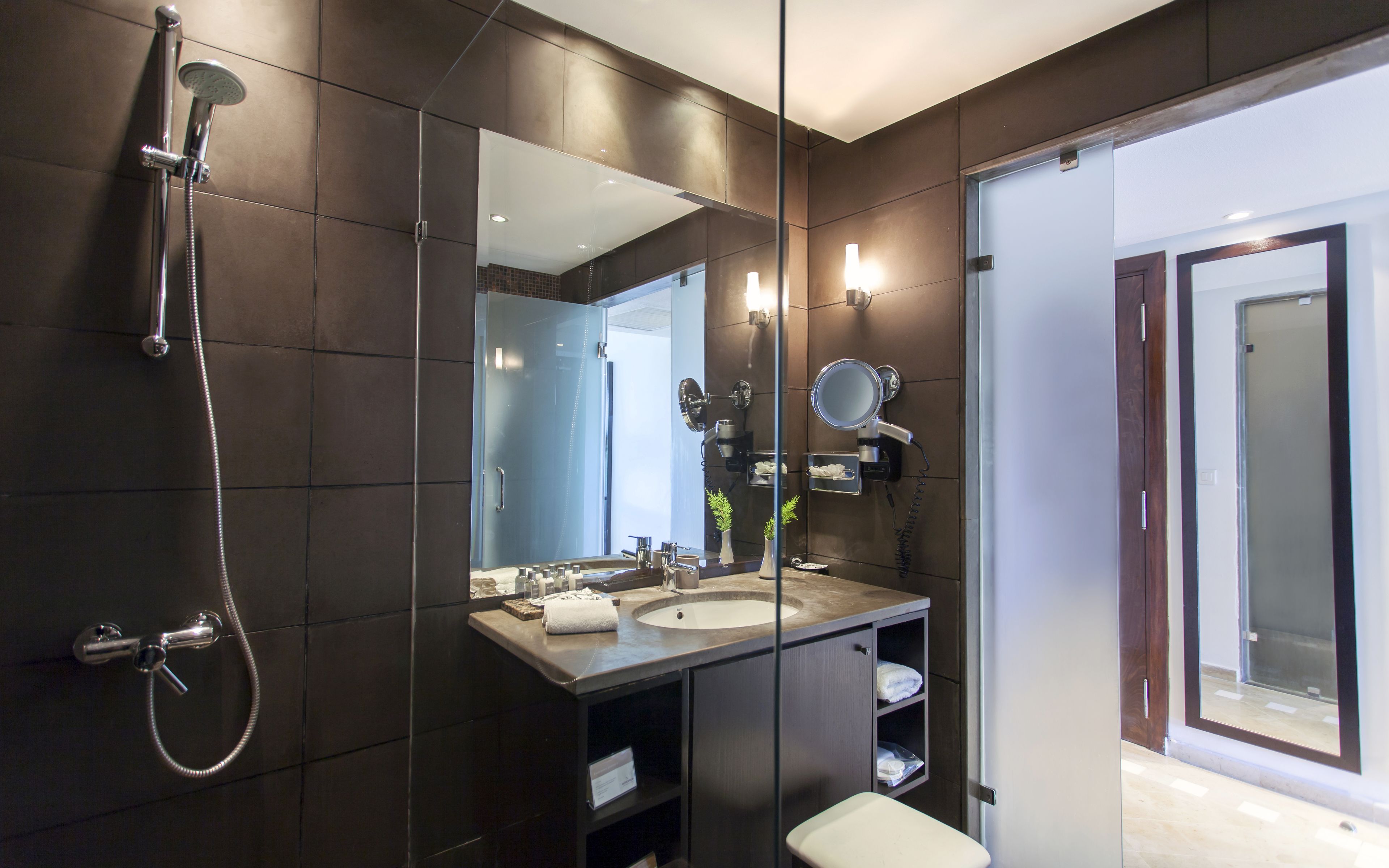 eco-friendly toiletries, hair dryer, bathrobes, slippers