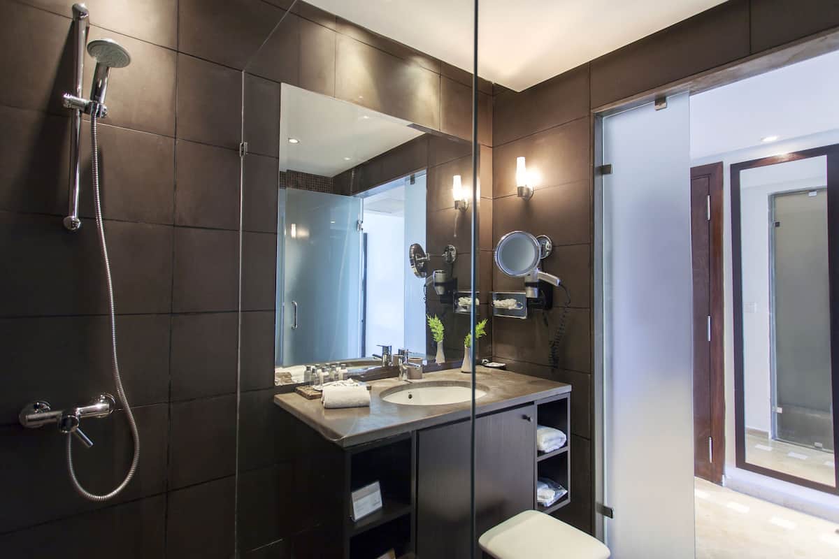 eco-friendly toiletries, hair dryer, bathrobes, slippers