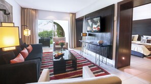 Junior Suite, Sea View | Living area | 33-inch LCD TV with satellite channels, TV