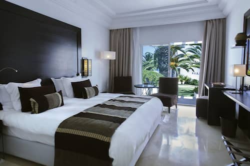 Habitación Premium, 1 cama King size, vista al mar | Ropa de cama de alta calidad y minibar
