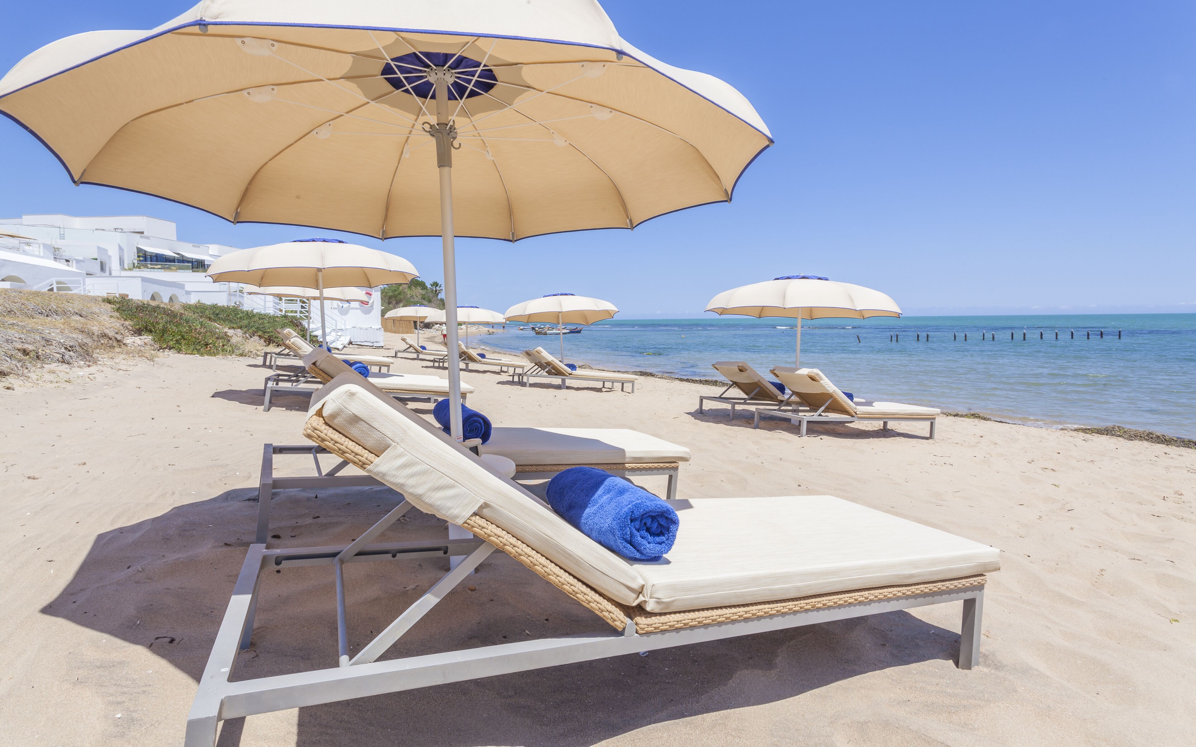 private beach, sun-loungers, beach umbrellas, beach towels
