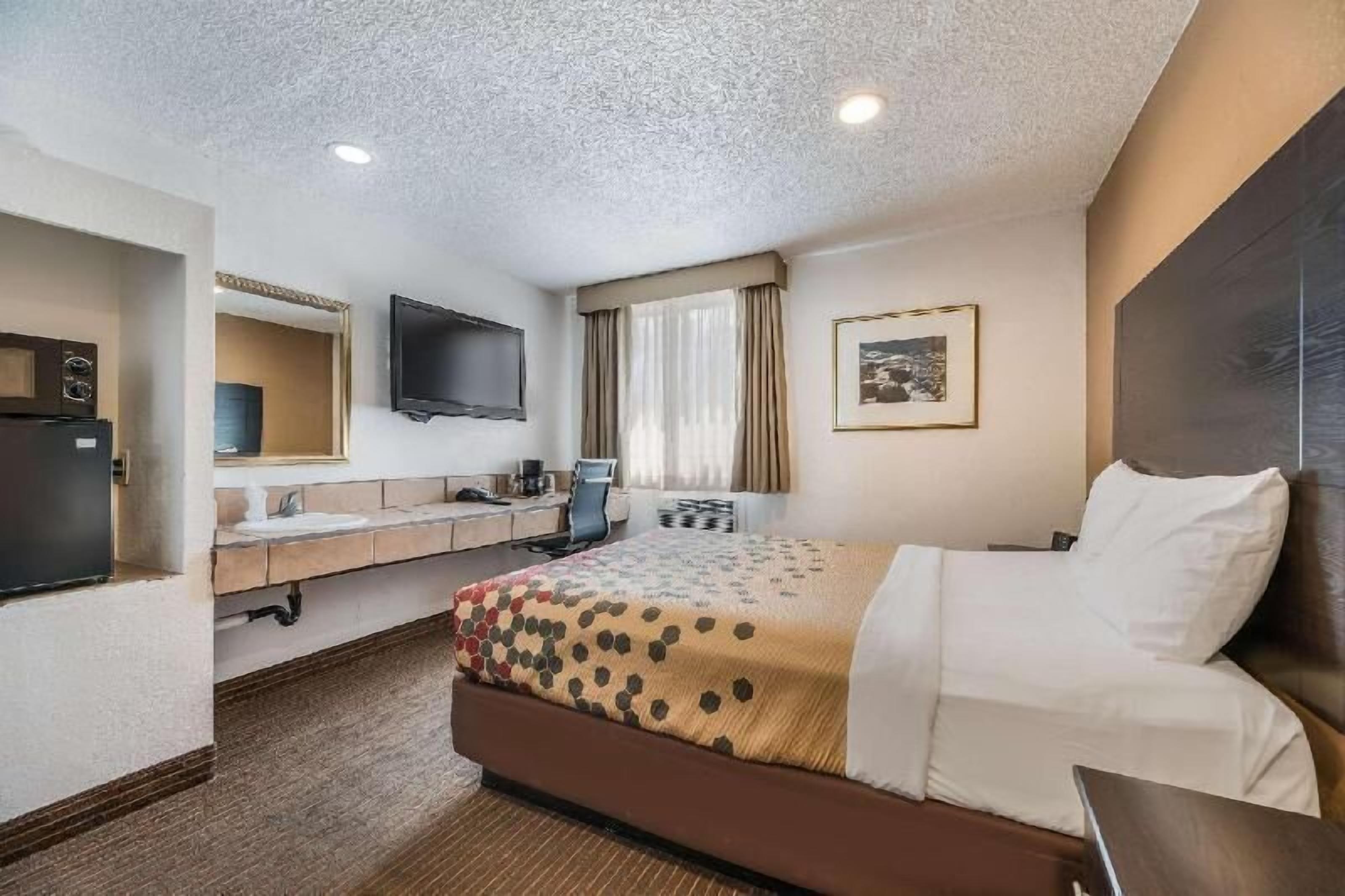 Escritorio, cortinas blackout, wifi gratis y ropa de cama 