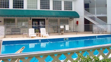 Outdoor pool, open 8:00 AM to 10:00 PM, pool loungers