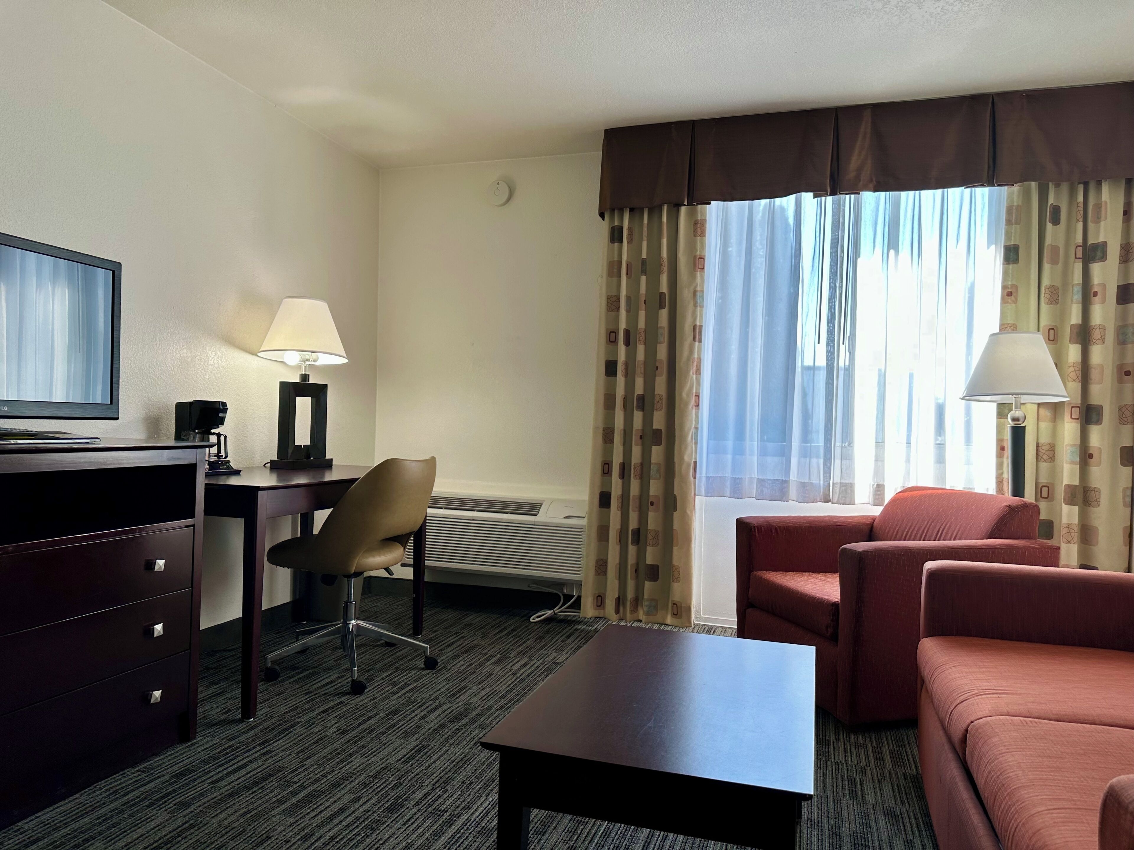 Suite, 1 King Bed, Non Smoking | Living area | LED TV