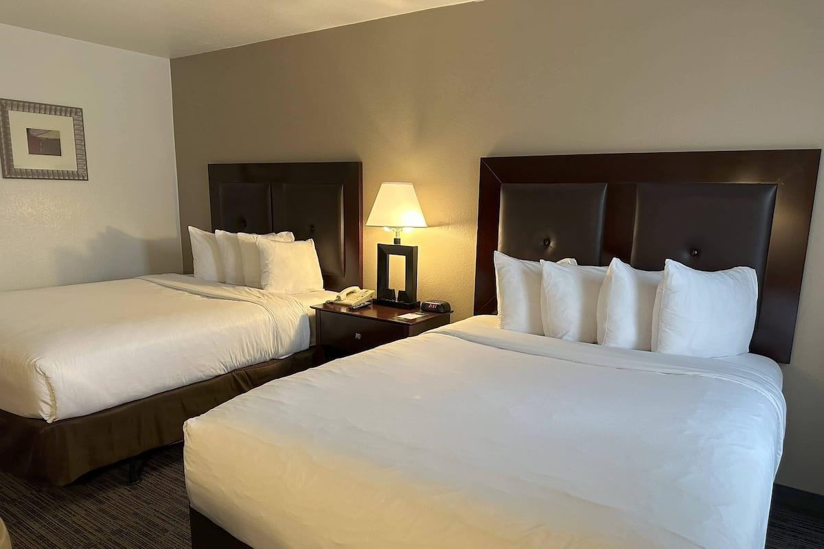 Standard Room, 2 Queen Beds, Non Smoking | Pillowtop beds, desk, laptop workspace, blackout drapes