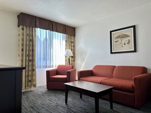 Suite, 1 King Bed, Non Smoking | Living area | LED TV