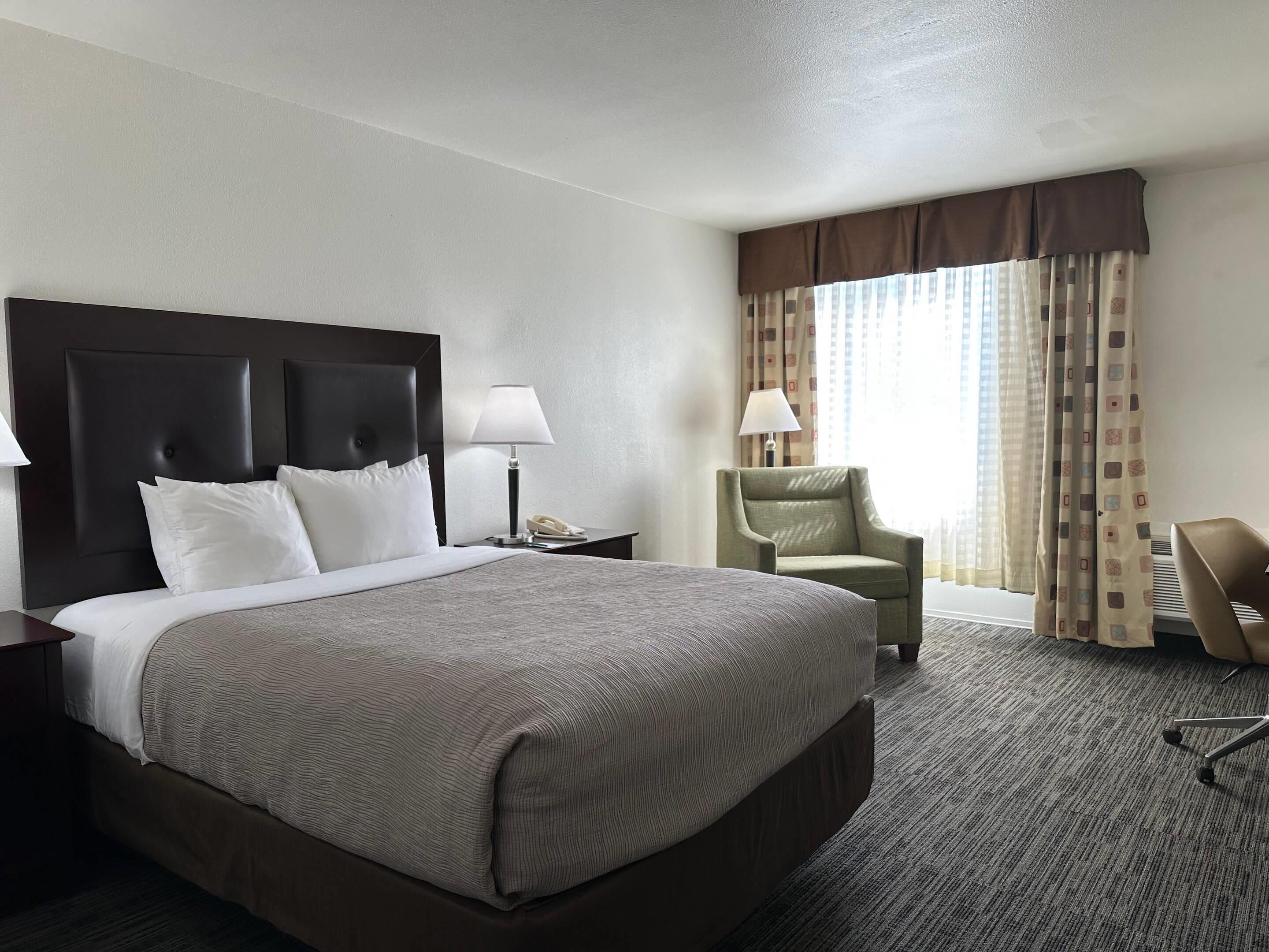 Suite, Multiple Beds, Non Smoking | Pillowtop beds, desk, laptop workspace, blackout drapes