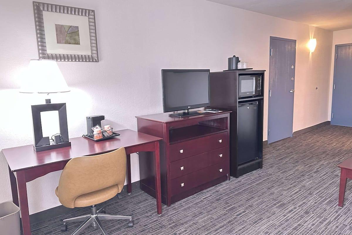 suite, 1 king bed with sofa bed, accessible, non smoking | pillow-top beds, desk, laptop workspace, blackout curtains