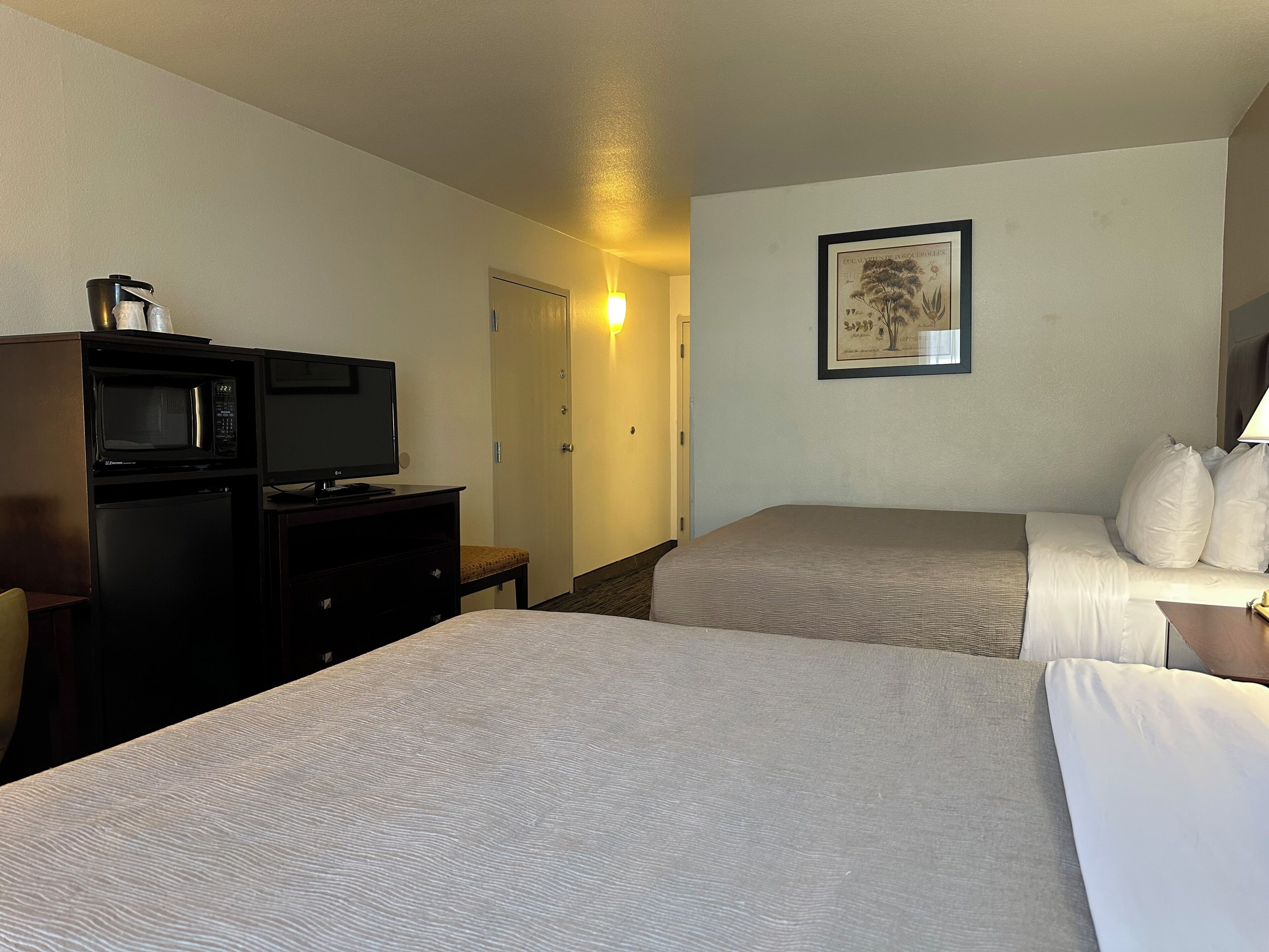Pillow-top beds, desk, laptop workspace, blackout curtains