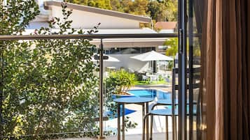 Suite, Multiple Beds, Pool View | Terrace/patio