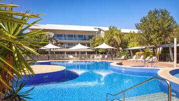 Outdoor pool, open 6:00 AM to 10:00 PM, pool umbrellas, pool loungers