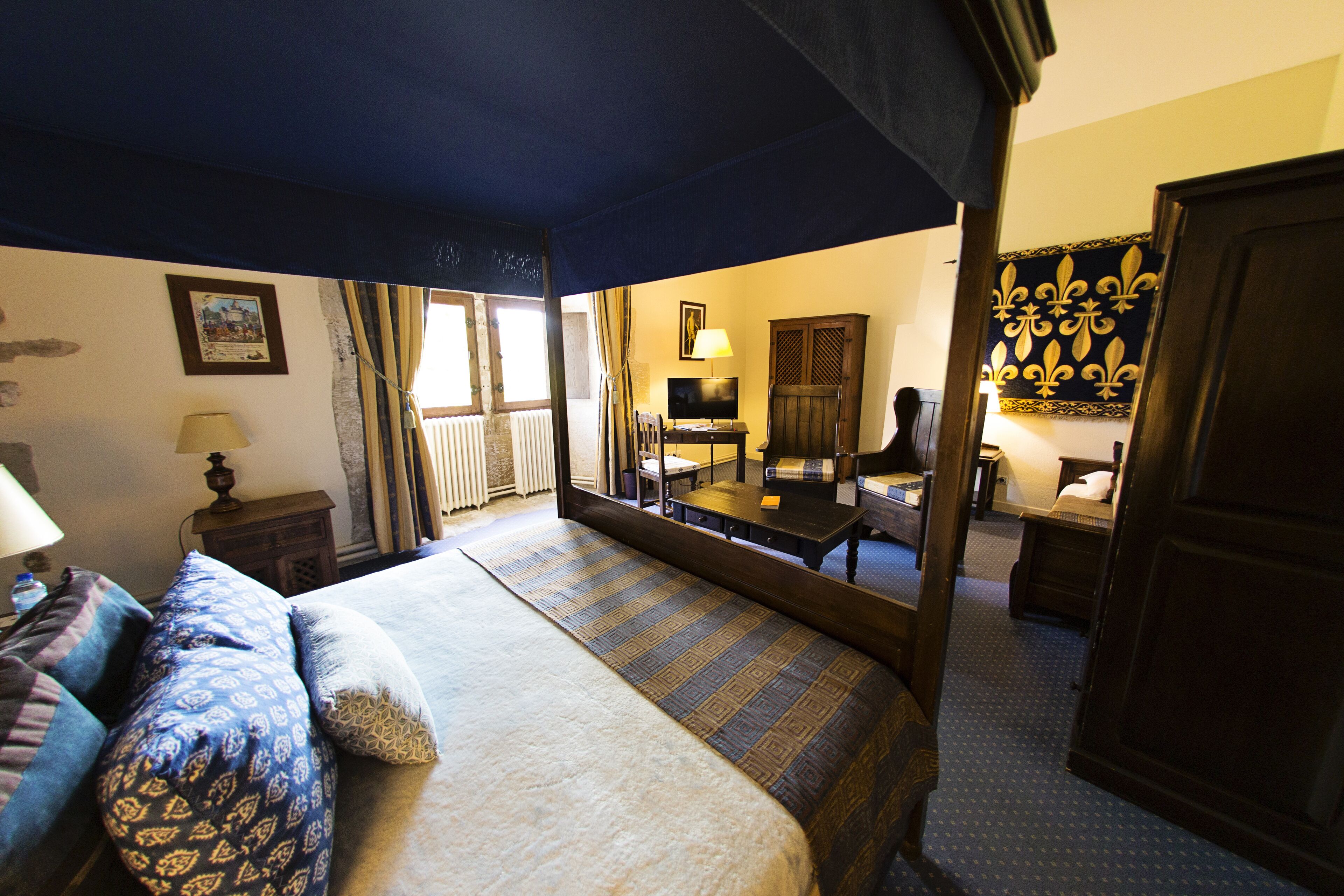 junior suite | in-room safe, individually decorated, desk, iron/ironing board