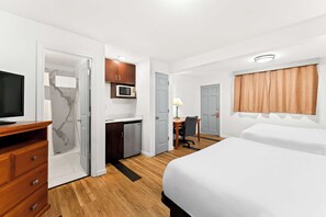 Premium bedding, pillow-top beds, desk, blackout curtains