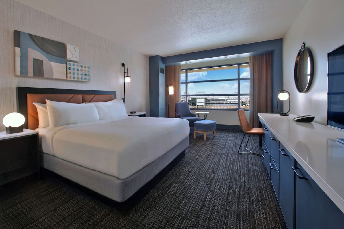 Premium bedding, pillow-top beds, in-room safe, laptop workspace