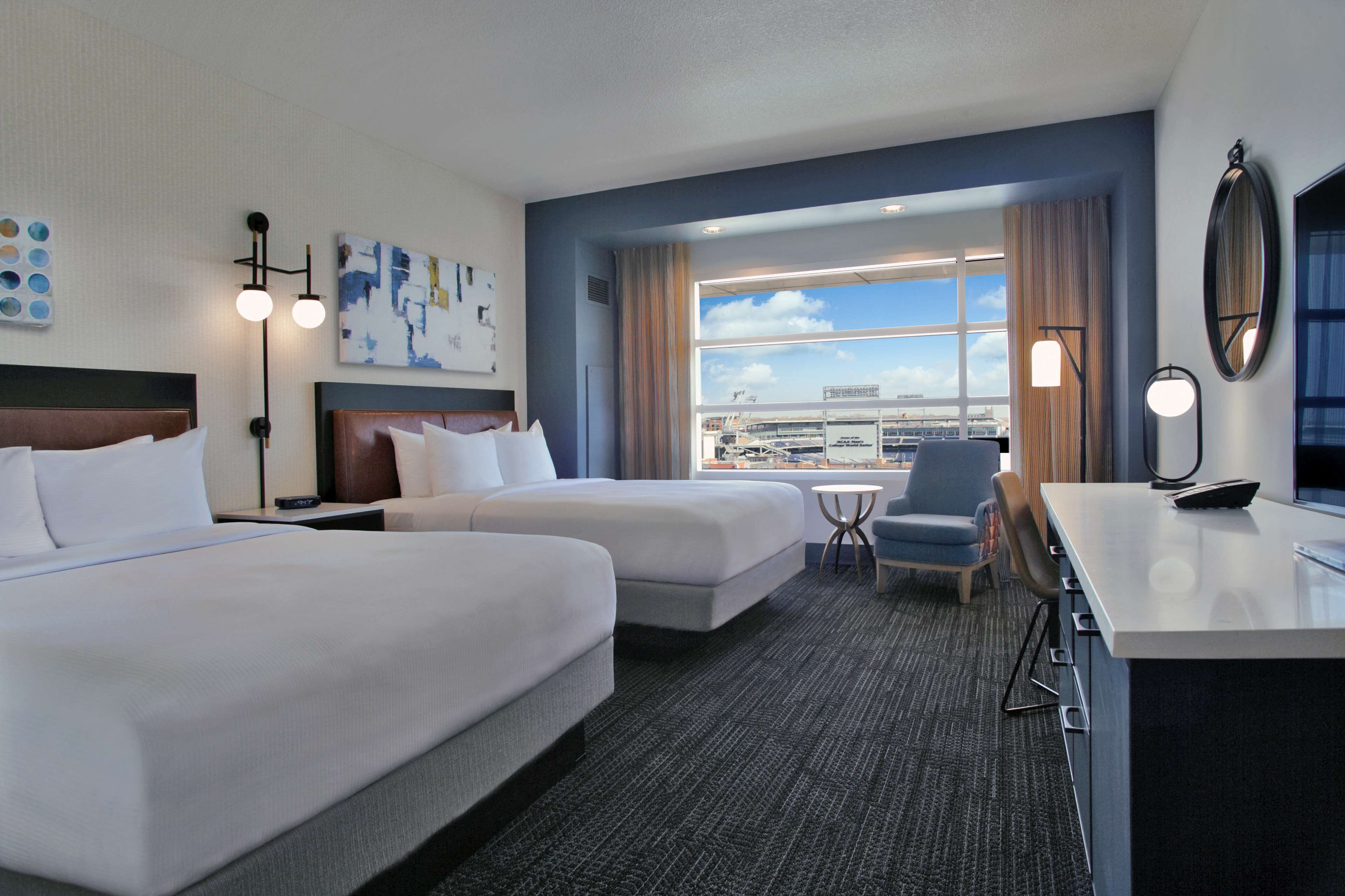Premium bedding, pillow-top beds, in-room safe, laptop workspace