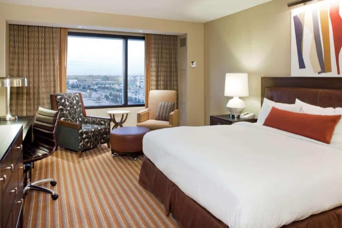 Premium bedding, pillow-top beds, in-room safe, laptop workspace