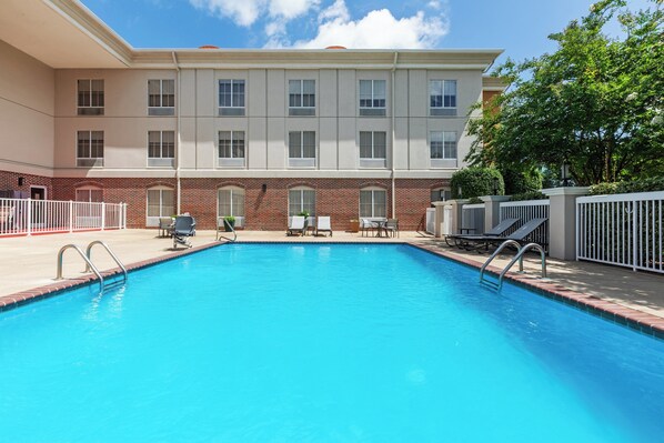 Outdoor pool, open 8 AM to 9 PM, pool loungers