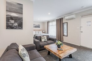 Executive Suite, 1 King Bed, Jetted Tub, Ground Floor | Premium bedding, desk, iron/ironing board, cribs/infant beds - Mandala Ace Albany Hotel (Centennial Park)