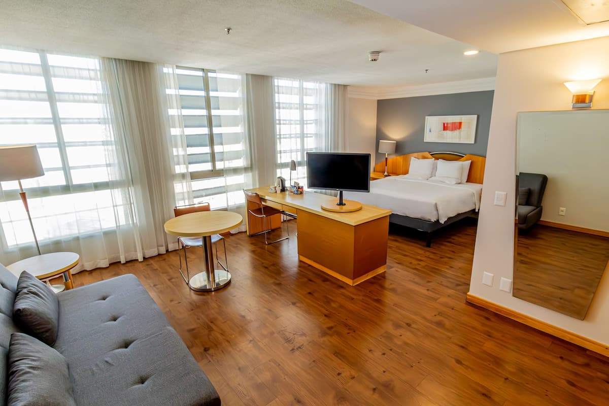 Family Room | 1 bedroom, minibar, in-room safe, desk