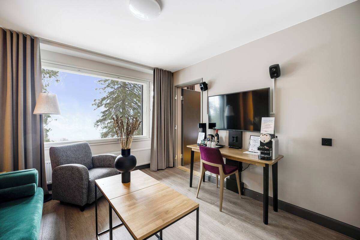 junior suite, 1 king bed (two extra beds possible) | blackout curtains, iron/ironing board, travel cot, free wifi