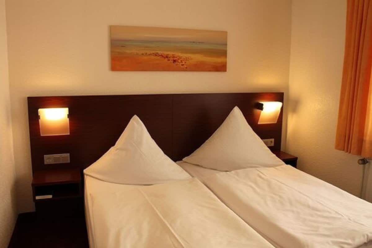 Premium bedding, pillow-top beds, in-room safe, desk