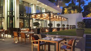 Breakfast, lunch, dinner served; Mediterranean cuisine, garden views