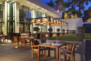 Breakfast, lunch, dinner served; Mediterranean cuisine, garden views 