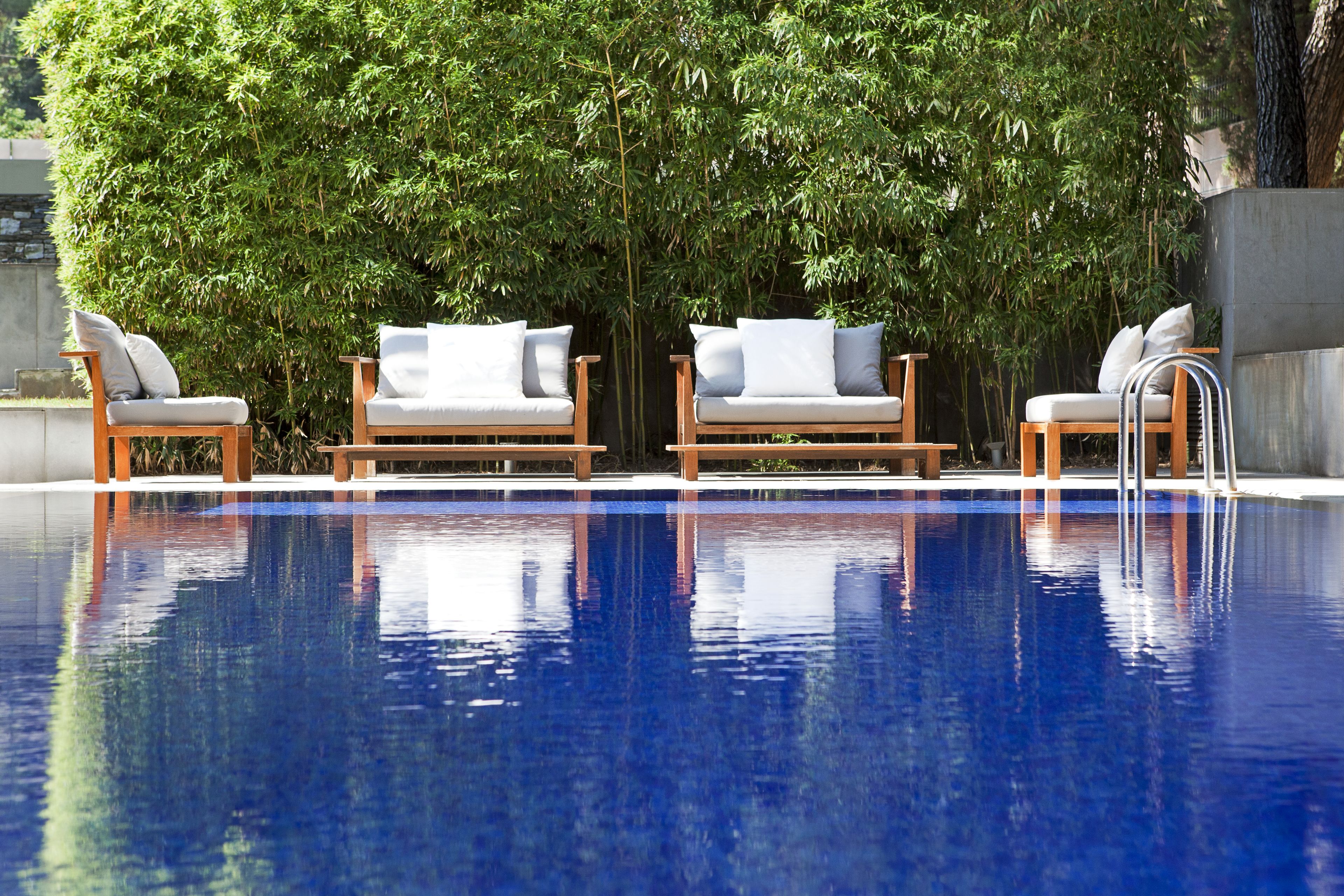 2 outdoor pools, pool umbrellas, pool loungers