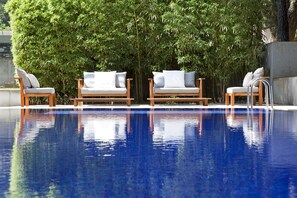 2 outdoor pools, pool umbrellas, pool loungers