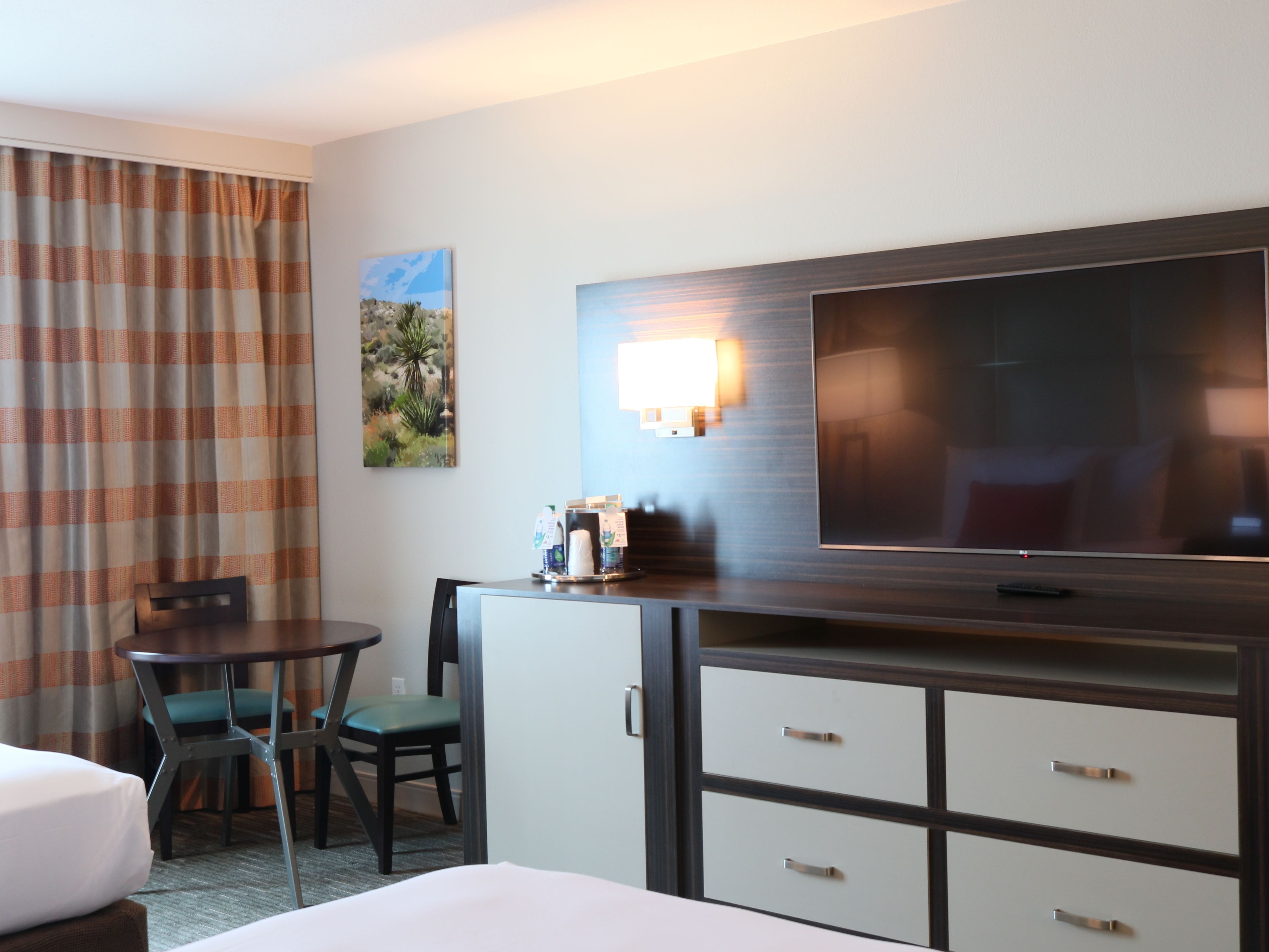 Luxury Two Queens Non-Smoking | Living area | Flat-screen TV