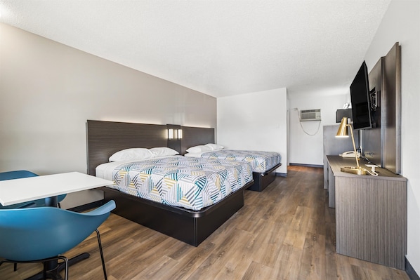 Wifi gratis, ropa de cama y despertador