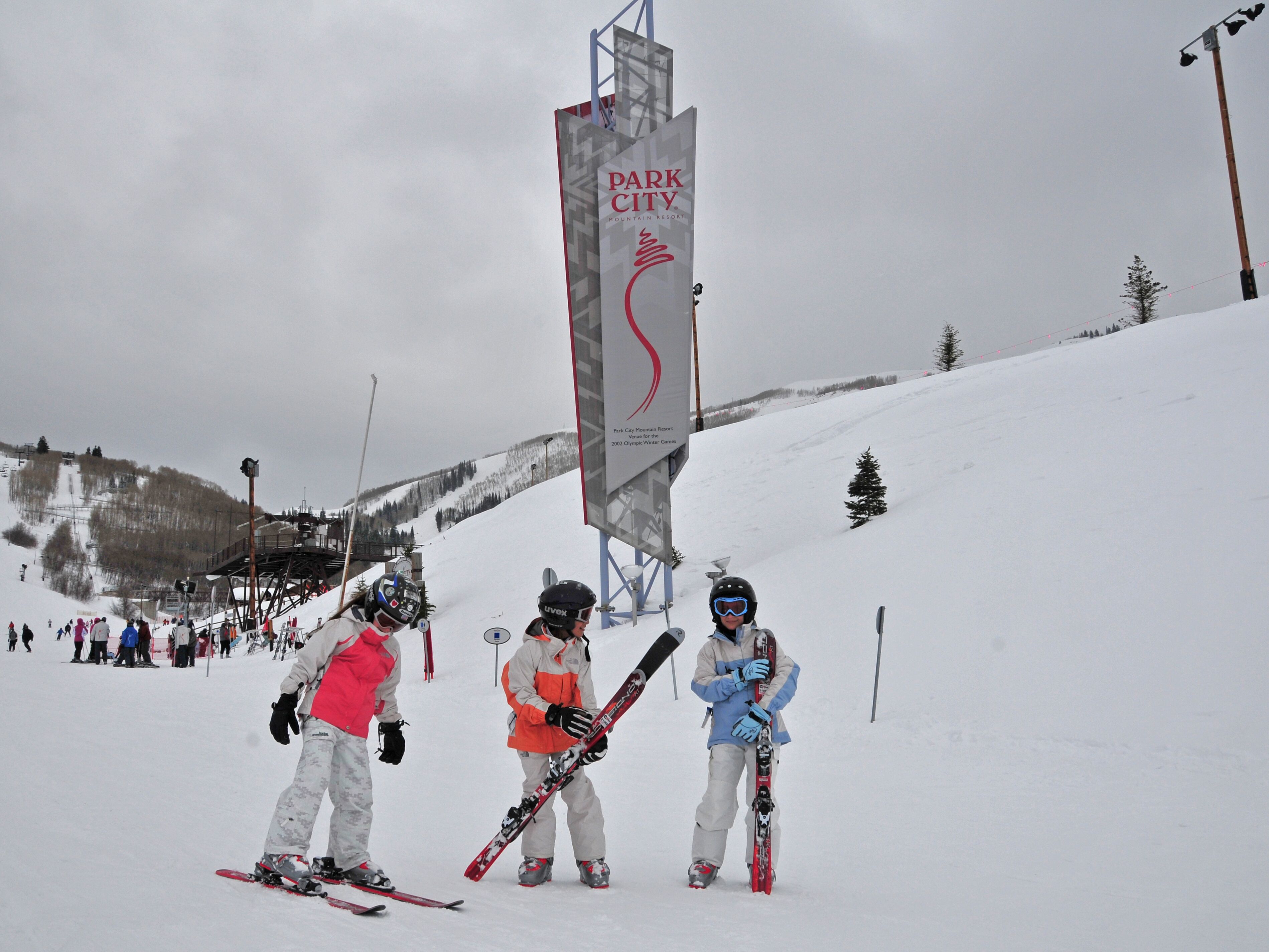 A ski resort with a prominent sign for Park City Mountain Resort.