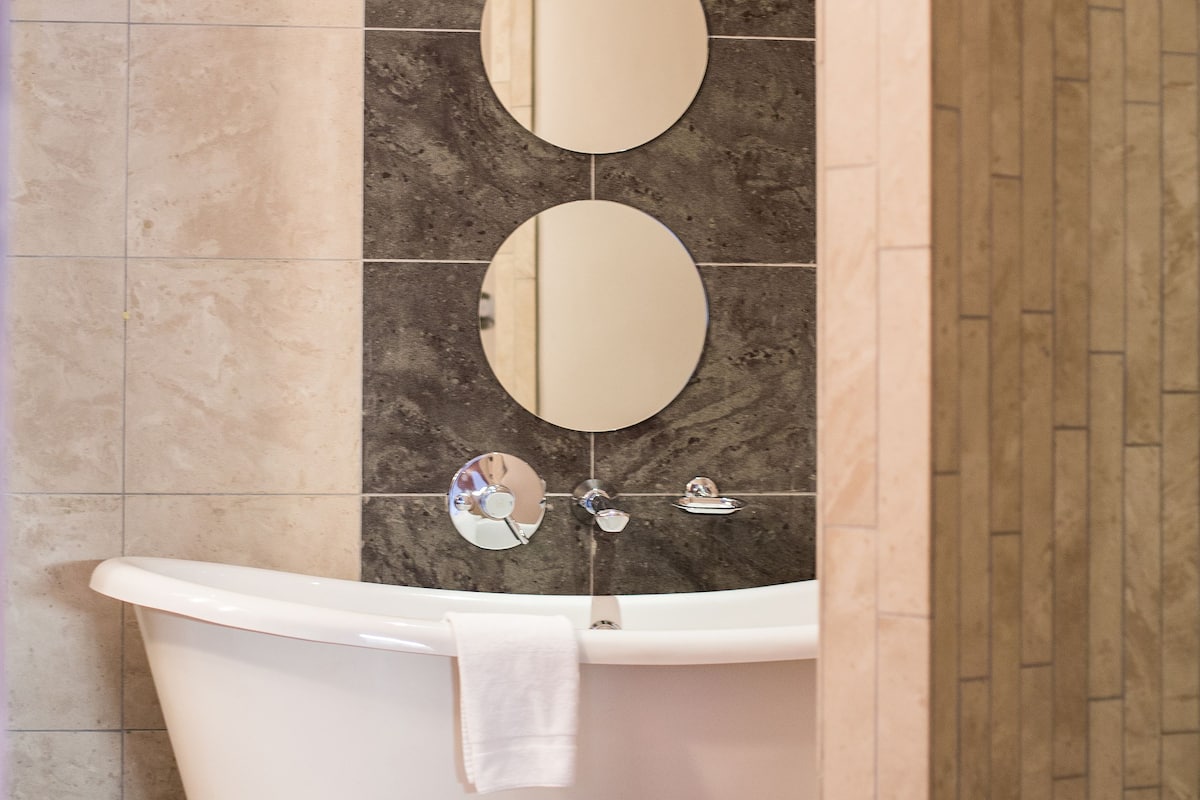 separate bathtub and shower, deep-soaking bathtub, free toiletries