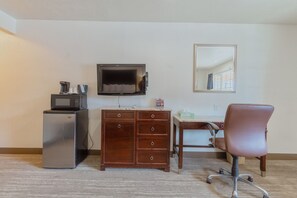 Premium bedding, desk, laptop workspace, blackout curtains