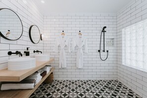 Shower, eco-friendly toiletries, hair dryer, bathrobes